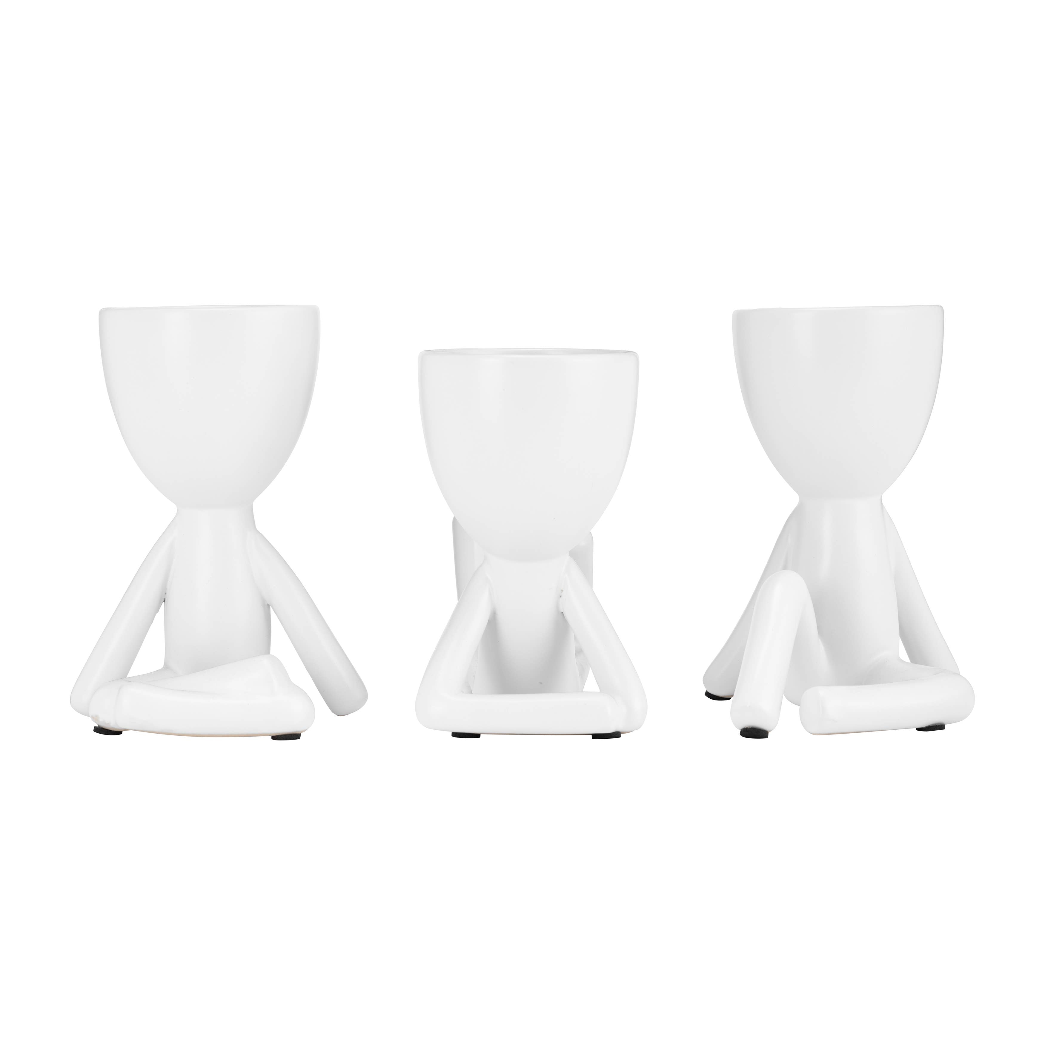 White Ceramic Sitting Humans