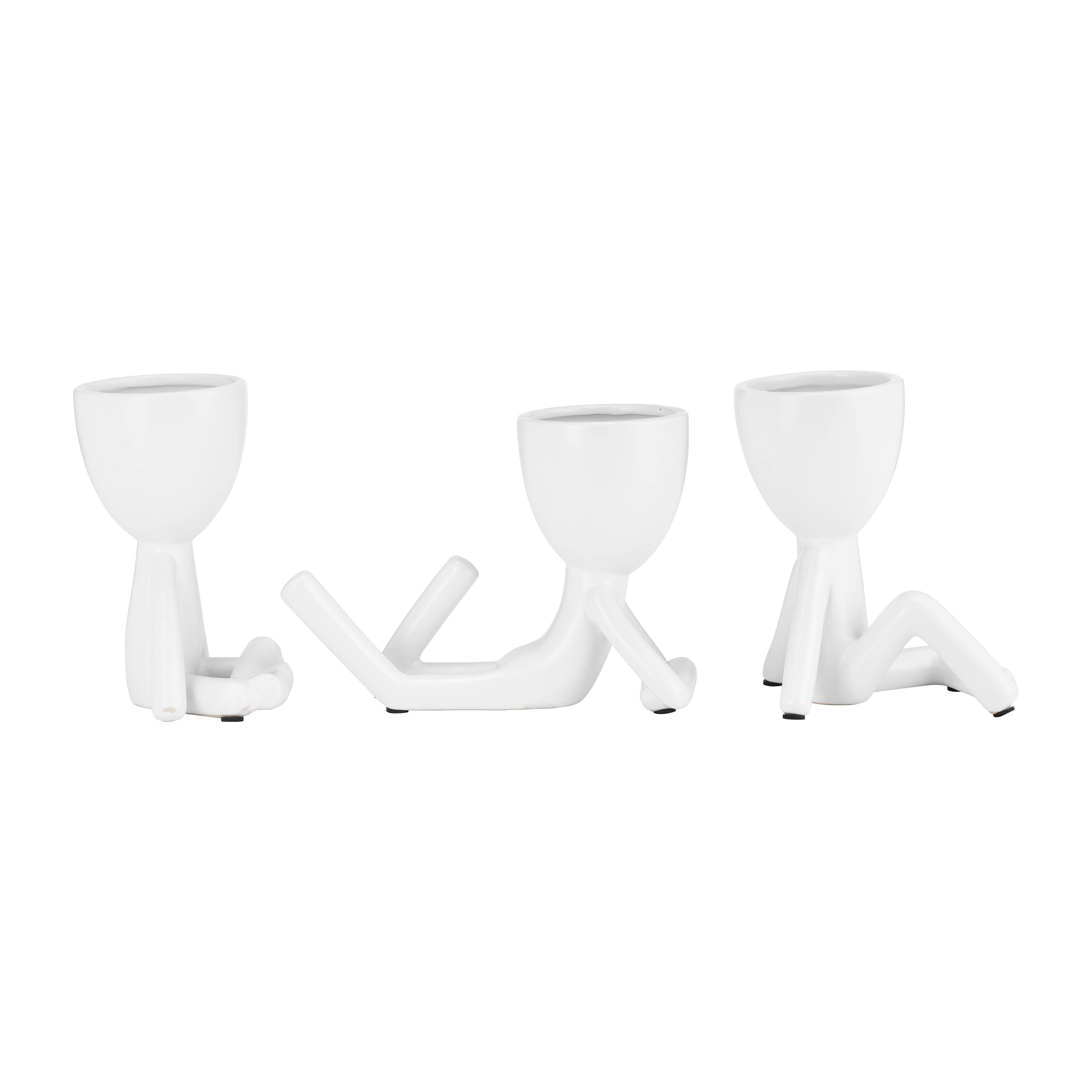 White Ceramic Sitting Humans